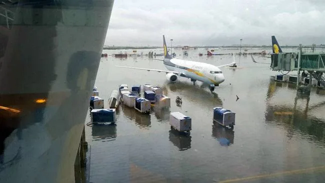 Aerial shot of Pune Airport runway and Viman Nagar streets submerged by heavy rain