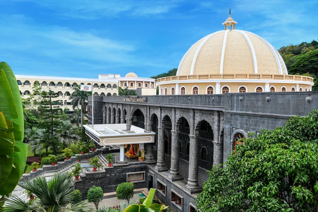 MIT World Peace University (MIT-WPU) campus in Pune, showcasing its distinctive white facade and expansive courtyard.