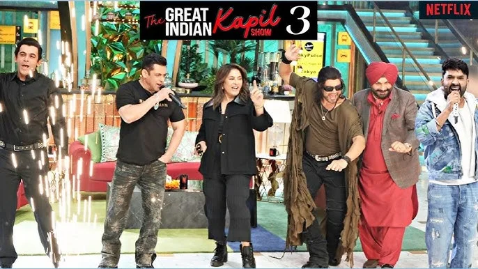 Salman Khan cracking a joke with Kapil Sharma reacting on a comedy show set, branded by puneripages.in
