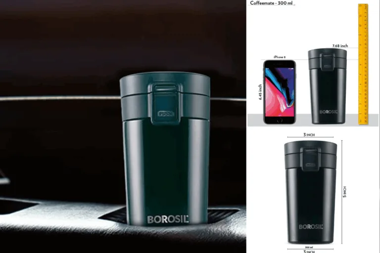 Borosil Hydra flask on a desk with books, laptop, and gym gear around, showcasing its everyday usability.