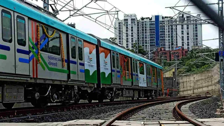 Pune Metro Line 3 train on elevated tracks over Hinjewadi area during trial run.