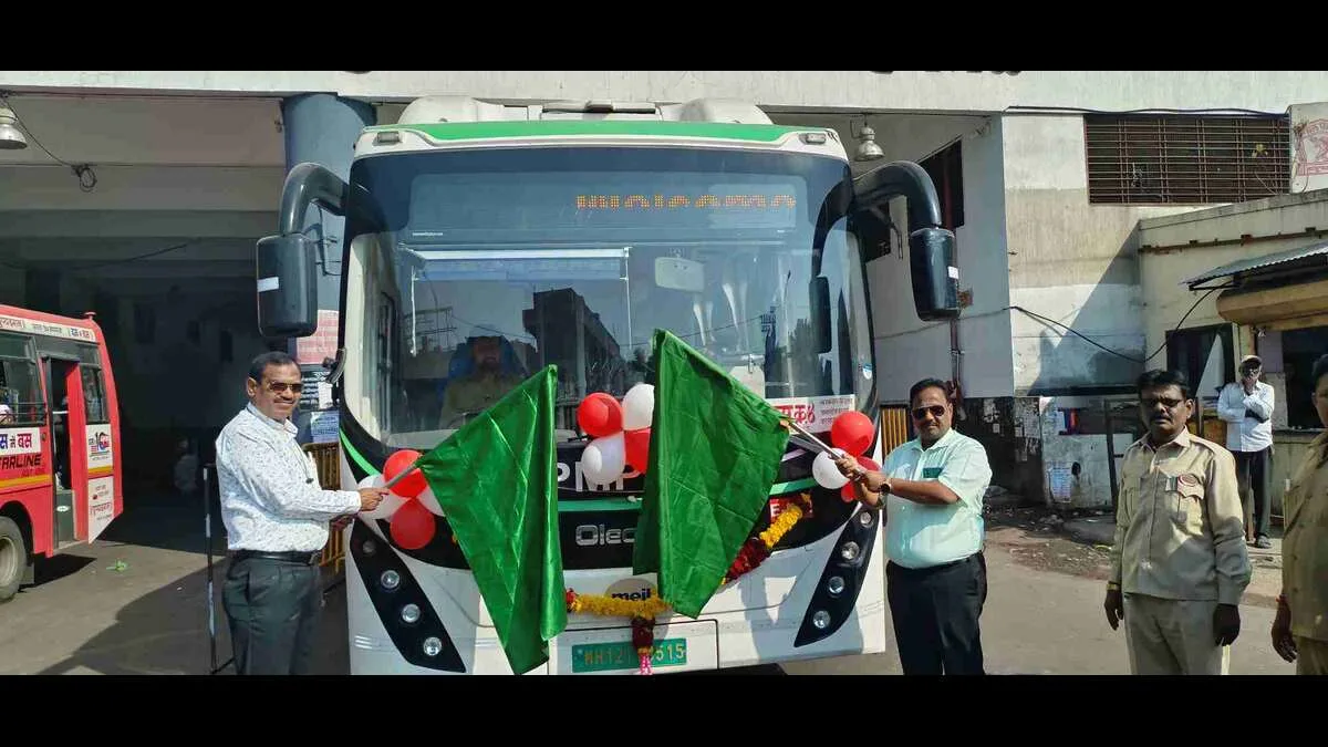 PCMC BRTS bus on dedicated corridor with commuters boarding and large text saying "Now Every 90 Seconds!"