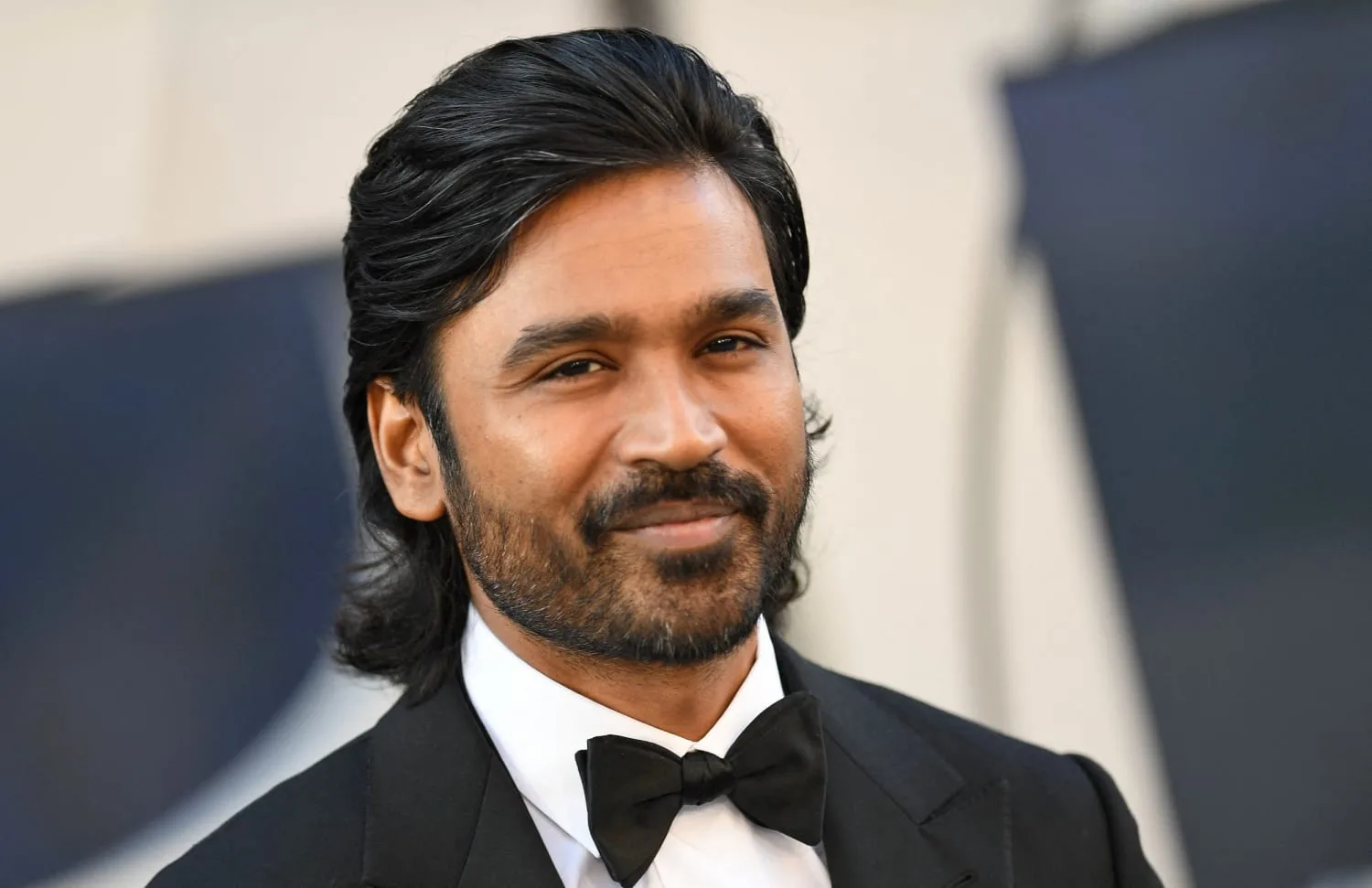 Collage of Dhanush’s film journey from Tamil cinema to Hollywood, with scenes from Kolaveri Di and The Gray Man.