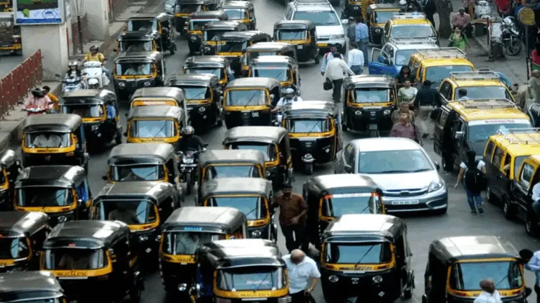 Empty rickshaw stand in Pune with passengers waiting during auto and cab strike.