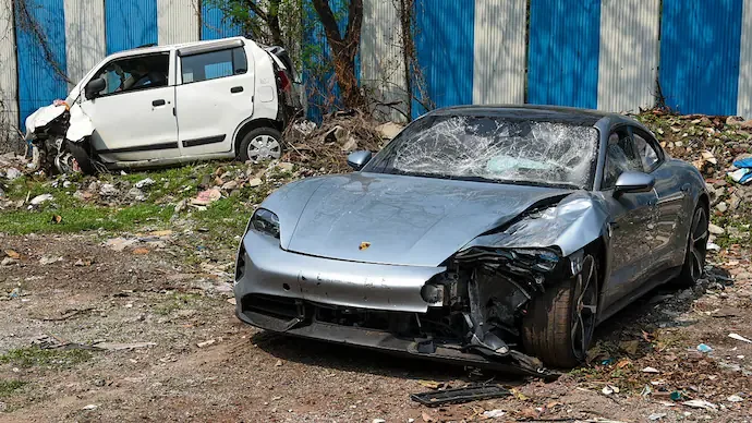 Illustration of a Porsche car under streetlights with a shadowy justice scale in the background and text reading “Justice in Question?” and “puneripages.in” overlayed.
