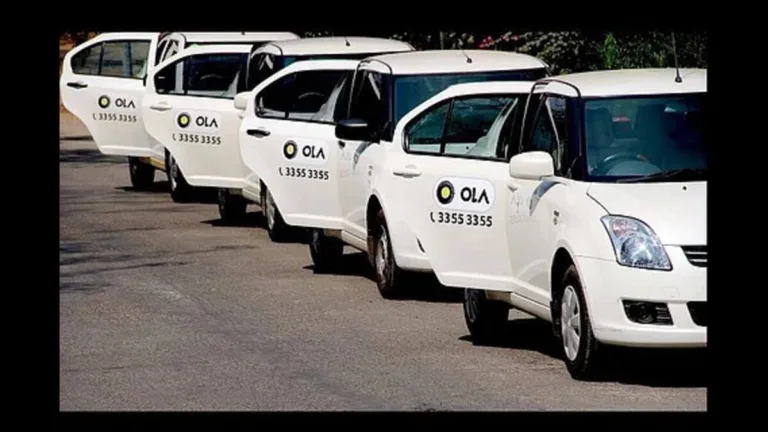 Ola and Uber surge pricing in Pune evening traffic near Hinjawadi with Uber app open on phone