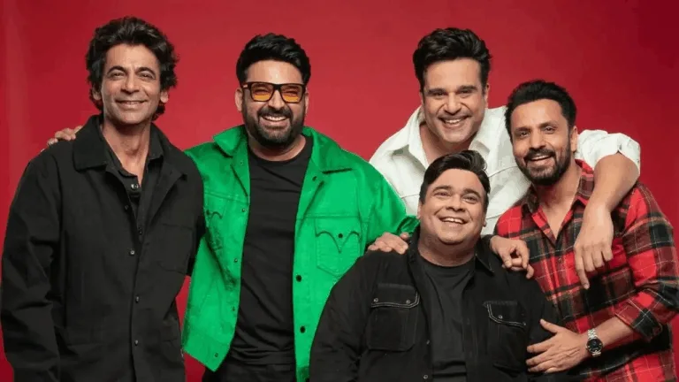 Empty comedy stage with spotlight symbolizing Rajiv Thakur's exit from The Kapil Sharma Show