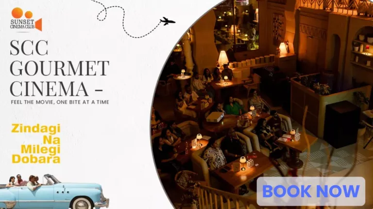 People enjoying a gourmet outdoor cinema experience in Pune inspired by Zindagi Na Milegi Dobara, blending film, food, and Spanish-inspired decor.