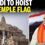 Dharm Dhwaj Hoisting at Ram Mandir in Ayodhya by PM Modi with saffron flag raised on temple spire.