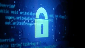Digital padlock on a screen of code, representing AI hacking and cyber security