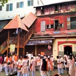 Crowded market lane in Pune during festive shopping season