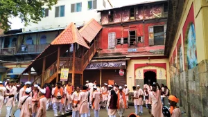 Crowded market lane in Pune during festive shopping season