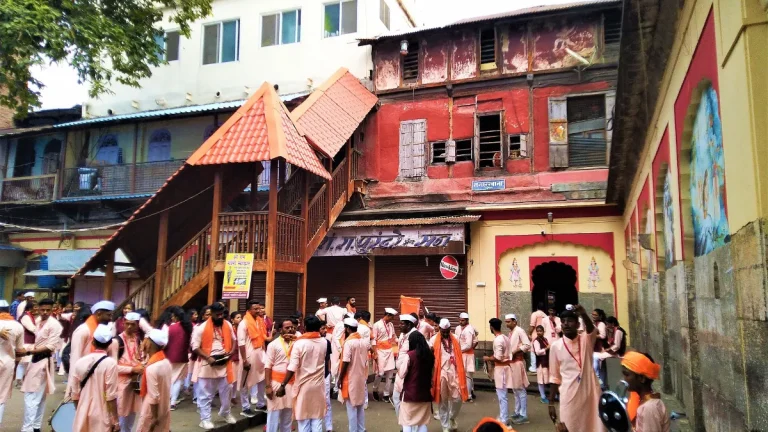 Crowded market lane in Pune during festive shopping season