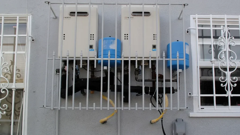 Electric water heaters mounted on a wall