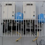 Electric water heaters mounted on a wall