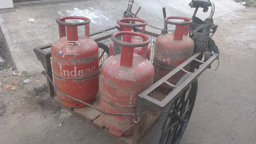 LPG gas cylinders on a delivery cart in India