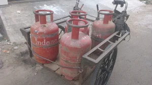 LPG gas cylinders on a delivery cart in India