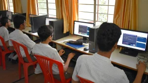 Candidates preparing for a government recruitment exam